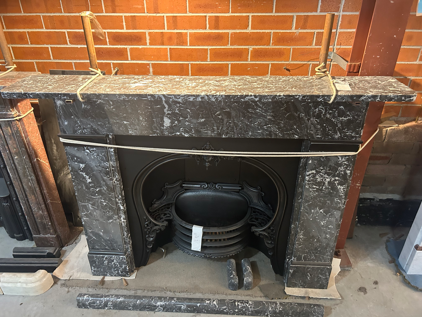 St Annes cast iron fireplace restored piece by piece, showcasing original period detailing and quality finish.