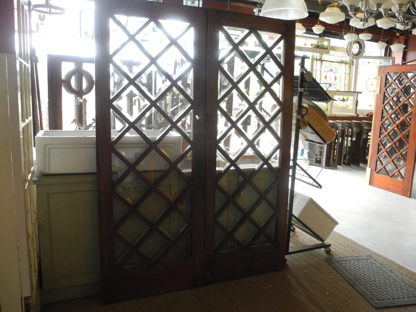 Matching pair of classic multi-pane glass internal timber French doors, available to buy at Chippendale Restorations second hand doors yard.