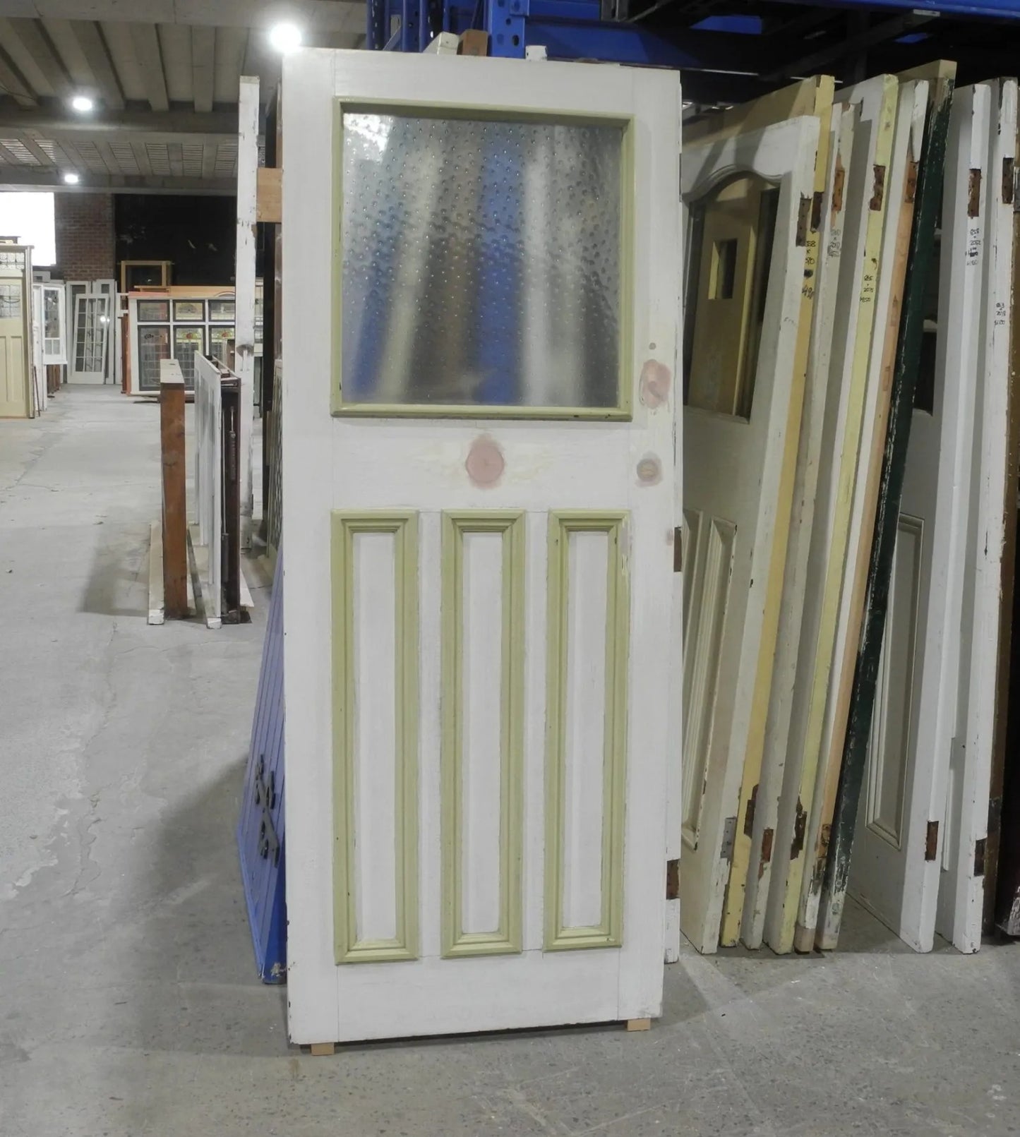 Original 1920s Edwardian solid timber front door featuring a geometric diamond leadlight glass window, available to buy at Chippendale Restorations second hand doors.