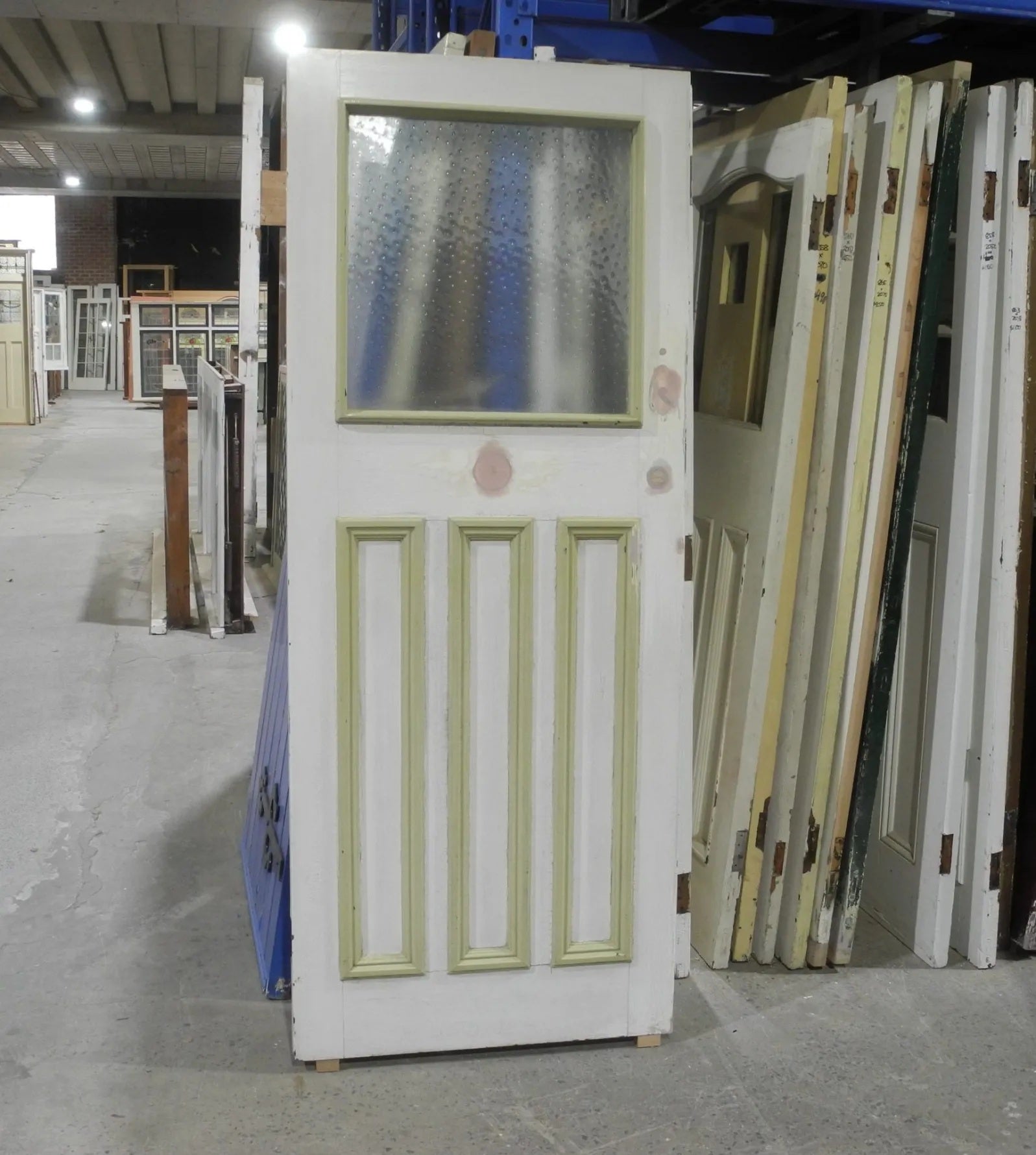 Original 1920s Edwardian solid timber front door featuring a geometric diamond leadlight glass window, available to buy at Chippendale Restorations second hand doors.
