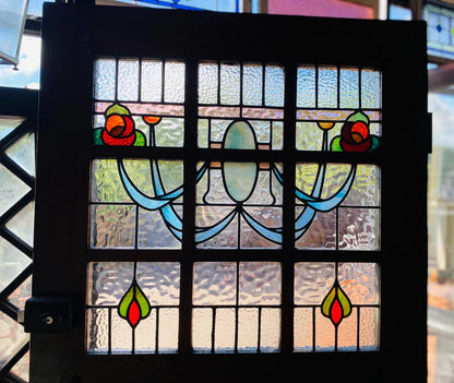 Stately pair of 1920s solid timber front doors with multi-textured geometric leadlight glass panels from Chippendale Restorations second hand doors warehouse.