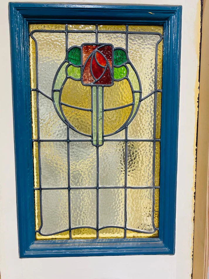 Intricate geometric leadlight glass panel configuration on a salvaged timber front door frame system from Chippendale Restorations.
