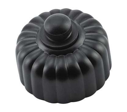 Detailed view of a Fluted Fan Controller with a ridged, textured control knob and a coordinating smooth or stepped round base plate, shown in a polished metal finish.