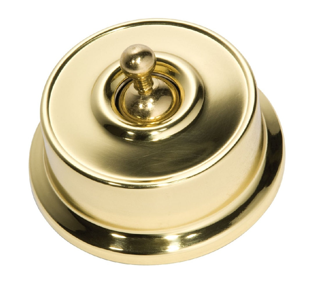 Close-up of a Federation Light Switch with a square or rectangular plate and a decorative edge, featuring a classic toggle or dolly switch, shown in a heritage metal finish.