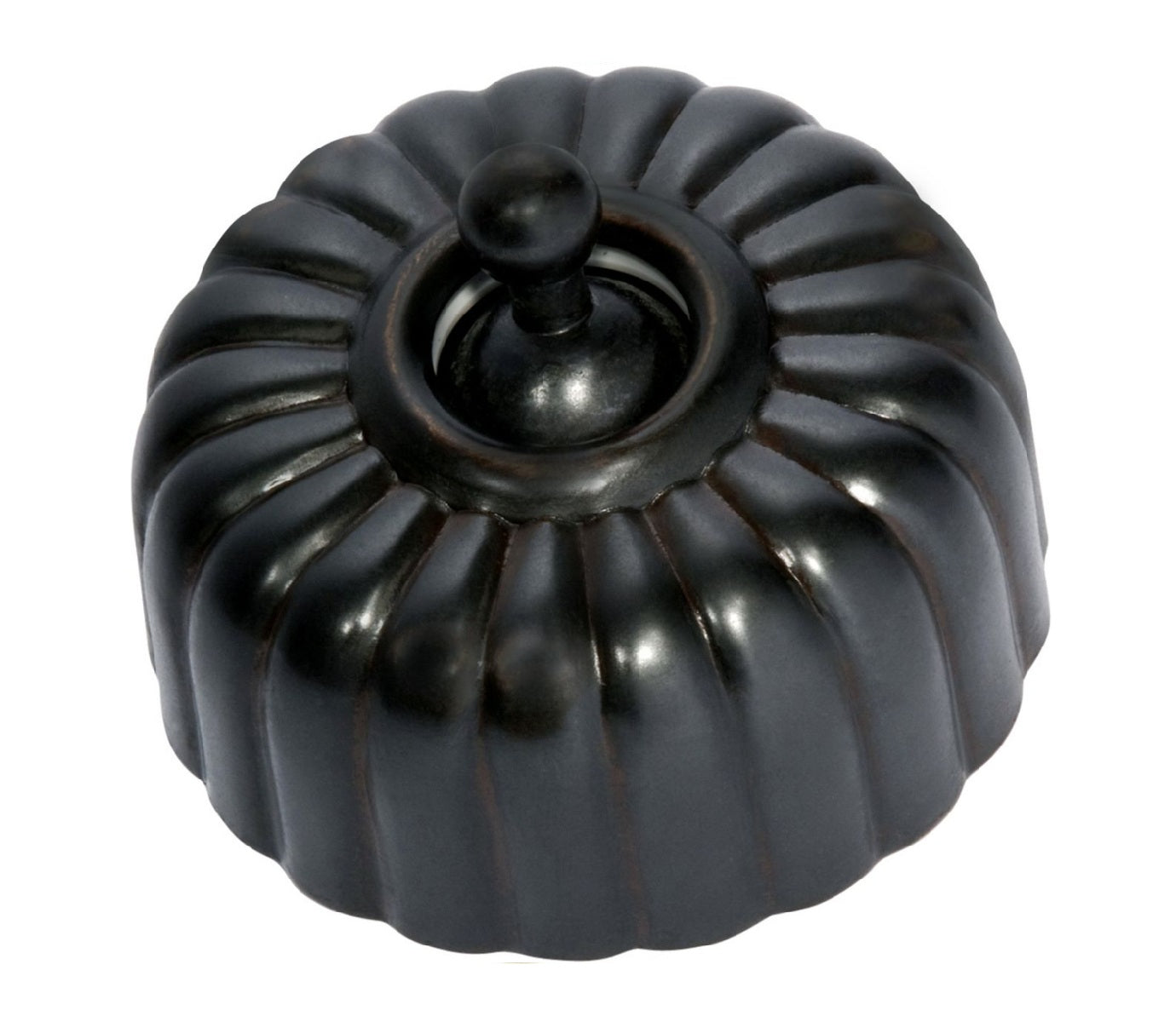 Close-up of a Fluted Light Switch wall plate and dolly switch, distinguished by its unique vertical ridged/ribbed design and presented in a polished or brushed metal finish.