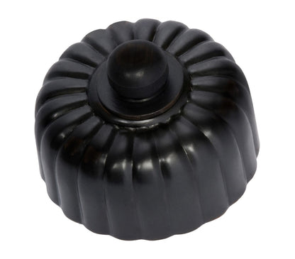 Close-up of a Fluted LED Dimmer switch with a textured, ridged knob and circular base plate, shown in a polished metal finish (e.g., polished brass or chrome).