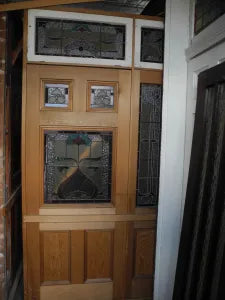 Solid timber Federation front door set with intricate leadlight glass inserts available at Chippendale Restorations for architectural salvage buyers.