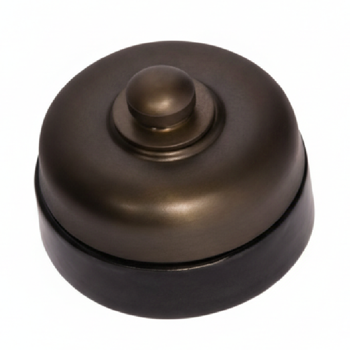 Close-up of a round Porcelain Base Fan Controller mounted on a wall. The switch has a central control knob, and the distinctive white ceramic base is visible against the wall surface.