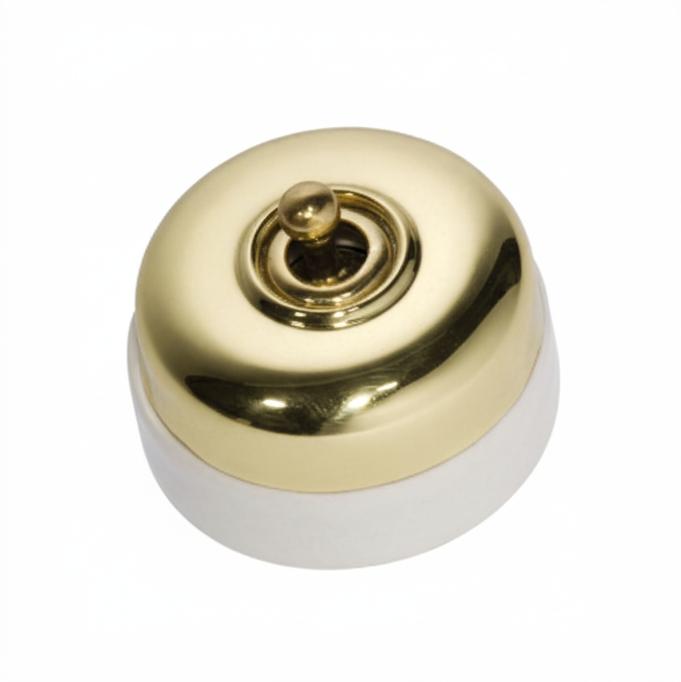 Porcelain-based electrical switch with a visible metal dolly. Available in a polished brass or antique brass finish on either a white porcelain base or a black porcelain base.