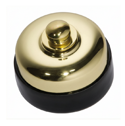 Close-up of a round Porcelain Base Fan Controller mounted on a wall. The switch has a central control knob, and the distinctive white ceramic base is visible against the wall surface.