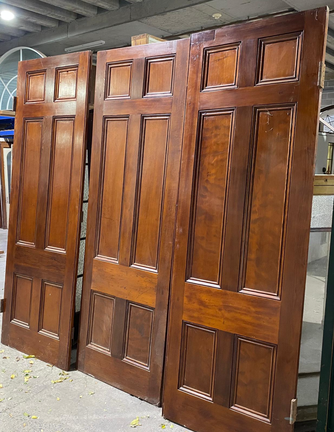 Premium Redwood Dividing Doors. Enhance your space with natural beauty and flexible room division. Custom-made, high-quality timber for a stunning, lasting finish.