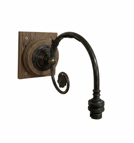 Close-up of a single curved metal light fixture arm (or wall sconce arm) on a plain white background, ready for mounting a lamp holder.