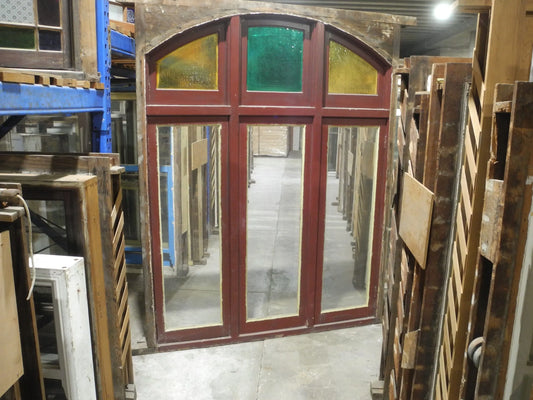 Arched Triple Casement Windows with Fanlights