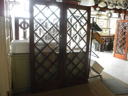 Matching pair of classic multi-pane glass internal timber French doors, available to buy at Chippendale Restorations second hand doors yard.